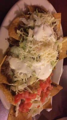 Just got my taco salad. The presentation looked good. Veggies look fresh. Had extra sour cream as asked for.