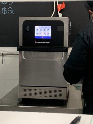 The machine that heats up your frozen wontons. Not entirely appetizing if you ask me...