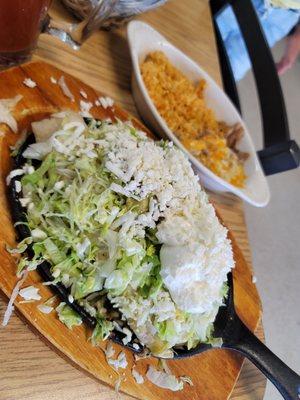 Enchiladas super michoacanas made with flour tortilla burnt potatoes and nasty