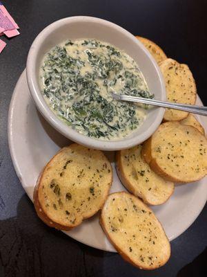 Spinach & artichoke dip was delicious!  pic looks smaller. The garlic bread slices are about the size of the palm of your hands. YUM