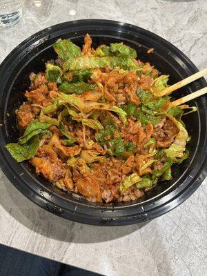 purple rice & lettuce, with 1/2 spicy chicken &   pork. Topped w bean sprouts & kimchi - sesame oil, spicy Seoul, & bejing.