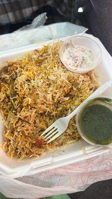 Chicken biryani with Rita and mint sauce