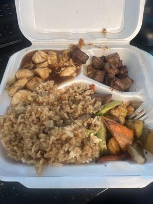 Hibachi steak and chicken with fried rice and veggies