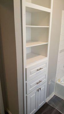 Paint on cabinets and new shelves with new drawers.