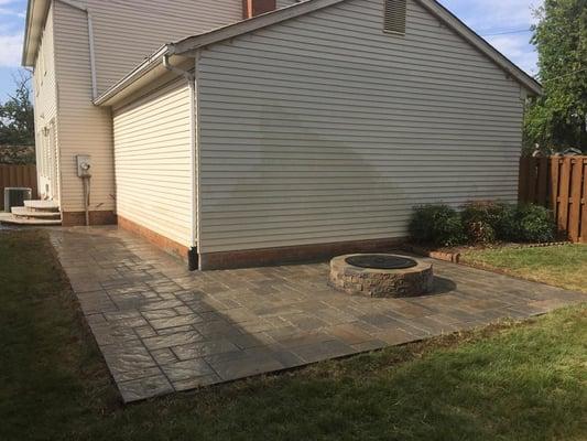 This house had an outdated red brick patio from when the house was built.  The new home owners wanted something a little more...