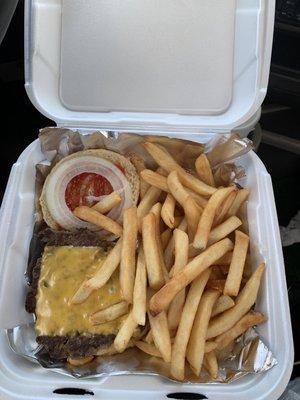 1/3 of a pound cheeseburger with catchup and onion and fries