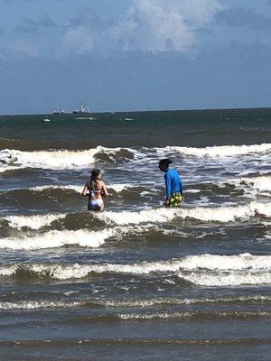 Anthony showing my daughter how to surf!