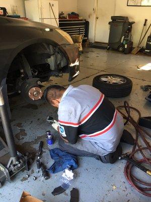 Joel working on my car.