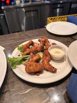 Fried Parmesan artichokes on the happy hour menu.