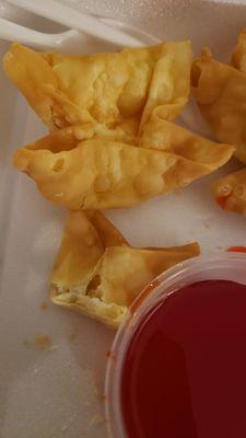 "Crab" puffs with no filling. Just badly fried wonton.