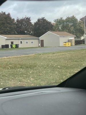 Church with dumpster.