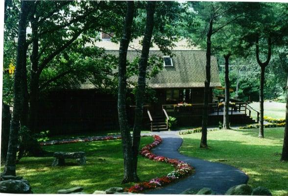 Follow the impatiens to the office from the annex.