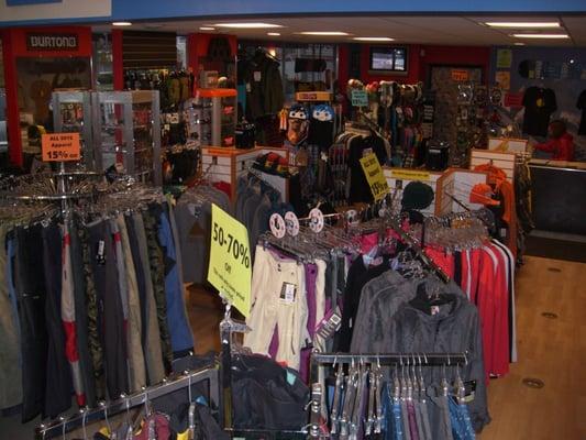 inside the shop on the 1st floor, packed with jackets, pants & accessories.