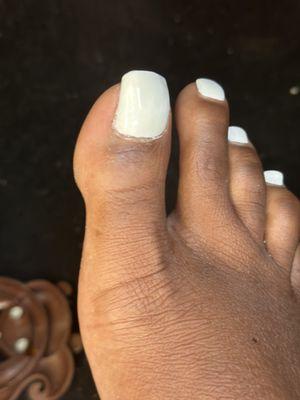 I came in to get a chipped big toe nail fixed It is uneven, was not buffed correctly or acrylic added to it well. Horrible