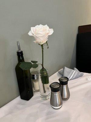 Fresh rose on the table