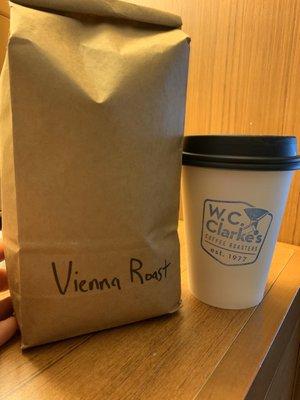 Small cup of coffee and fresh roasted bag of Vienna