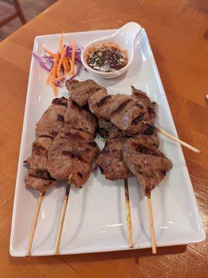 This is moo-ping it's pork on a skewer with a delicious tangy sauce, the meat is so tender it will just about melt in your mouth.