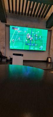 Big screen and games. Bar lounge area.