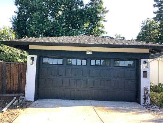 Installed Stamped Shaker Collection. Black Color, Tinted Glass.