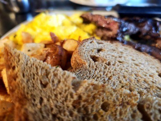 Steak and eggs with multigrain bread