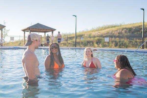 Heated pool with hot tub and grilling stations. Cabanas with lounge furniture to take a break from the sun.