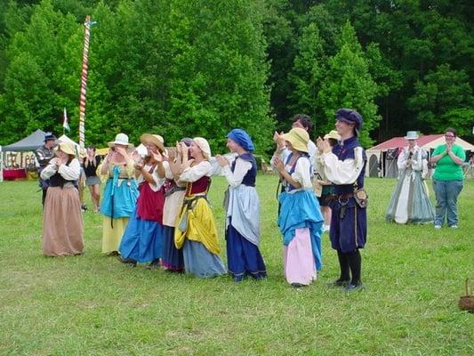 Townsfolk observing a real marriage proposal