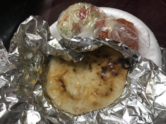 Pupusas next to the taco man