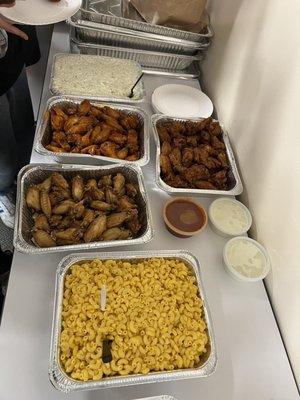 Mac & Cheese, dry rub wings, buffalo wings, honey barbecue wings, coleslaw