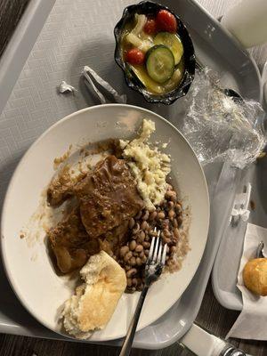 Smothered steak, cucumbers & onion salad, mashed potatoes, black eyed peas, yeast roll.