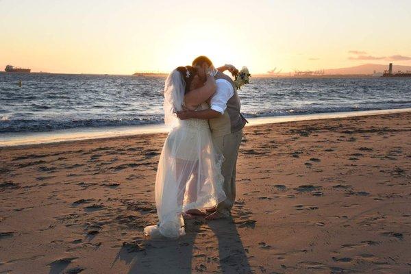 My sunset beach wedding photographed by Eugene Photography.