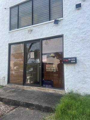 Shop front.  A little hard to see during the day but at night they turn on their lights that say 808 Karaoke.