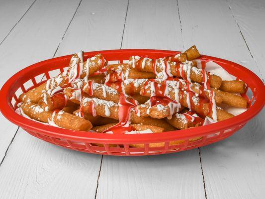 #Funny Fries
Step right up to our #Funny Fries - Deep Fried Funnel Fries topped with powdered sugar and your choice of 2 dessert sauces