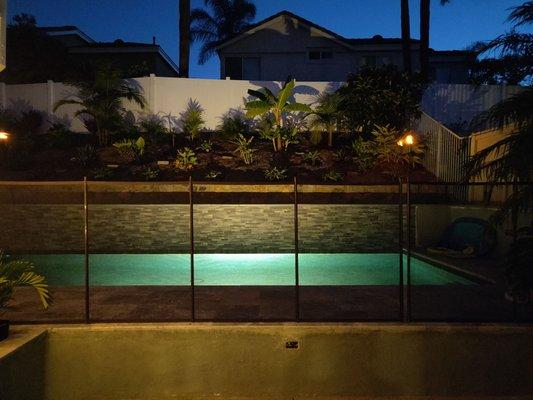 The pool looks amazing at night