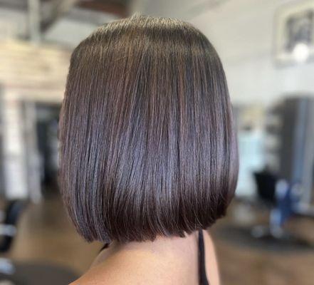 Precision haircut; sleek, chic, and classic.