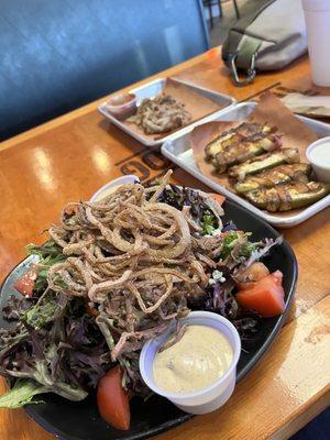 Jalapeño poppers, BBQ Salad with brisket and a side of pulled pork