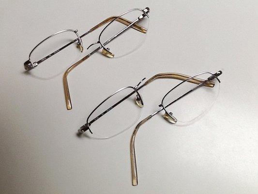 Two pairs of broken "Titanium" frames both less than one and a half years old each