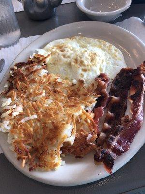 2 eggs any stile (over medium) bacon and hash browns