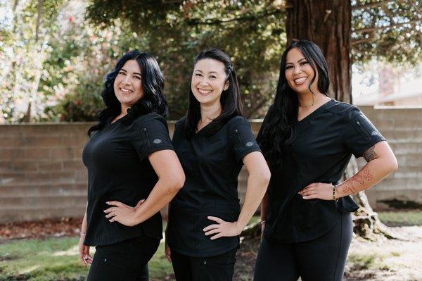 Our acne specialists Alyx, Janice, and Jasmine.