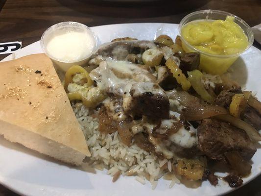 Cedars lamb over rice. Get it med rare. This is a good argument for best lamb at the best price in New Castle! The one with cheese.