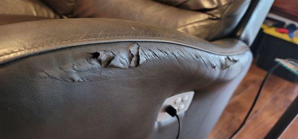 A little closer look.  This sofa is only 5 years old.  We were told we were buying leather.  Leather does not delaminate.