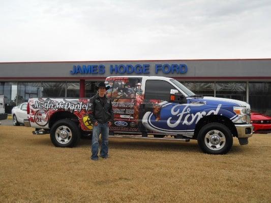 Justin McDaniel at James Hodge Ford picking up his new 2011 Ford F-250.