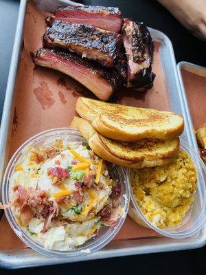 Half a slab of ribs, loaded potato salad, corn casserole! All of the items were so delicious!!