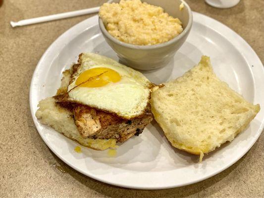 Grilled Salmon Biscuit with a sunny side up egg.