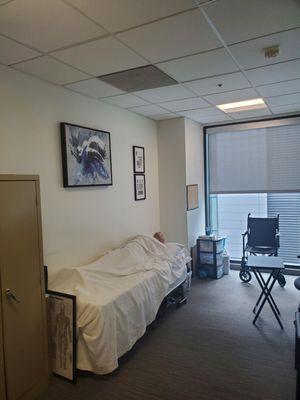 Hands-on training room, with life-size and weighted dummy patient. Registered Nurse provided training.