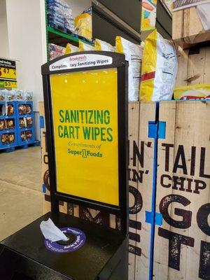 Sanitizing cart wipes at the entrance.