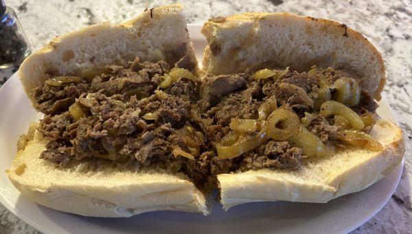 Cheesesteak- hot peppers cooked and on a fresh toasted roll. Not bad, but a tad on the greasy side.