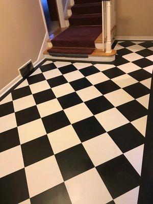 Custom Tiled Floors @ Seestedt's.  We can make a floor that is completely your own, one of a kind!  This floor is done with VCT.