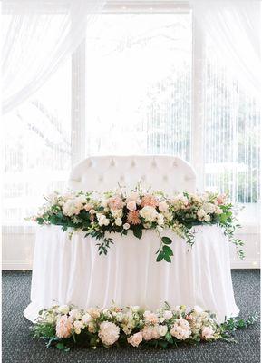 Sweetheart table with Village Florist