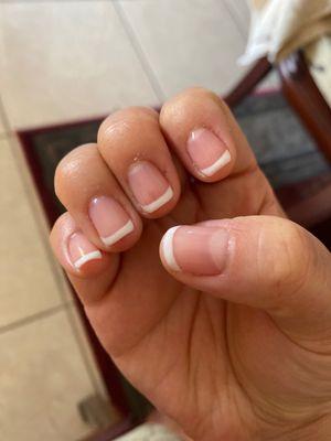 My cuticles are not cleaned up and my French tips have varying degrees of thickness and arches