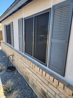 Front of the house screen windows.